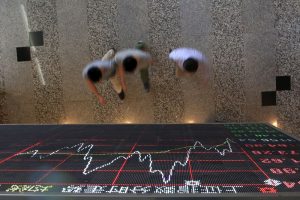 Asian stocks slammed by China woes, higher U.S. inflation