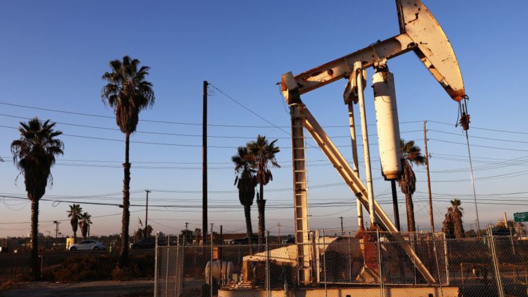 Oil prices settle at 10-month high as Saudi, Russia extend supply cuts