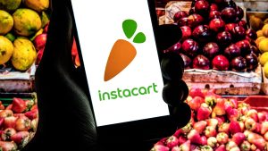 Instacart shares start trading on Nasdaq at $42, valuing grocery delivery company at about $14 billion